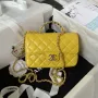 Chanel AS4140 Camellia Embossed With top Handle Bag Yellow