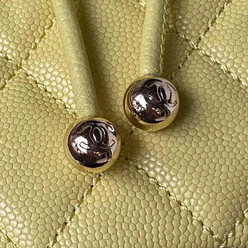 Chanel AS4058 Backpack Grained Shiny Calfskin & Gold Tone Metal Yellow