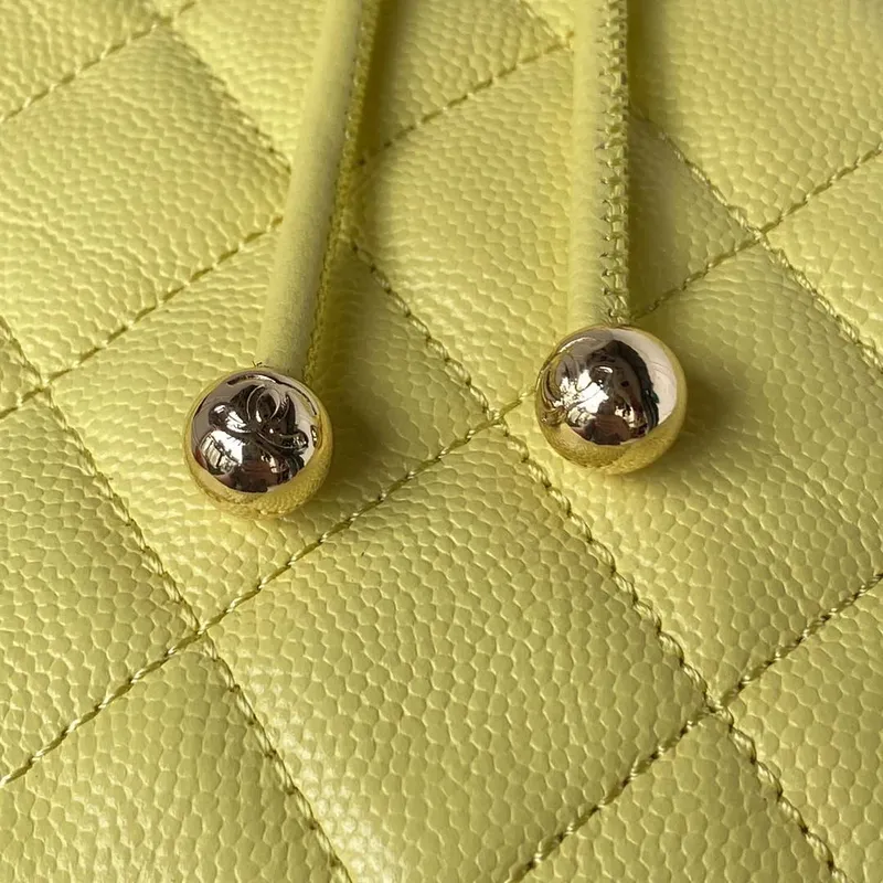 Chanel AS4059 Large Backpack Grained Shiny Calfskin & Gold Tone Metal Yellow