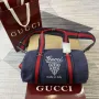 Gucci 816865 Small Printed Canvas Duffle Bag Dark blue