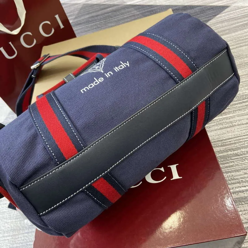 Gucci 816865 Small Printed Canvas Duffle Bag Dark blue