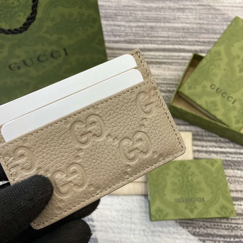 Gucci 815883 GG Emblem card case Taupe Leather