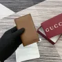 Gucci 818953 GG Emblem bi fold embossed card case Brown