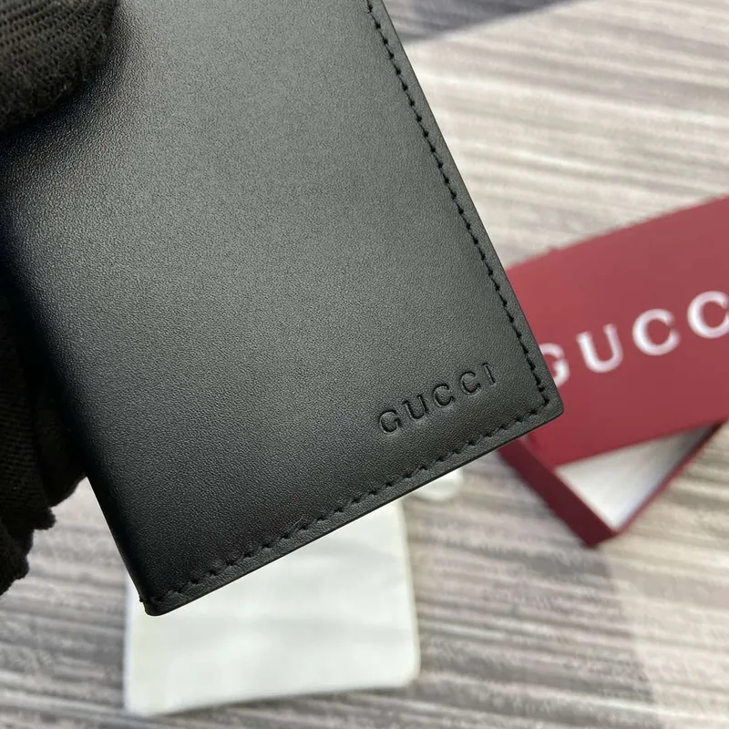 Gucci 818953 GG Emblem bi fold embossed card case Black