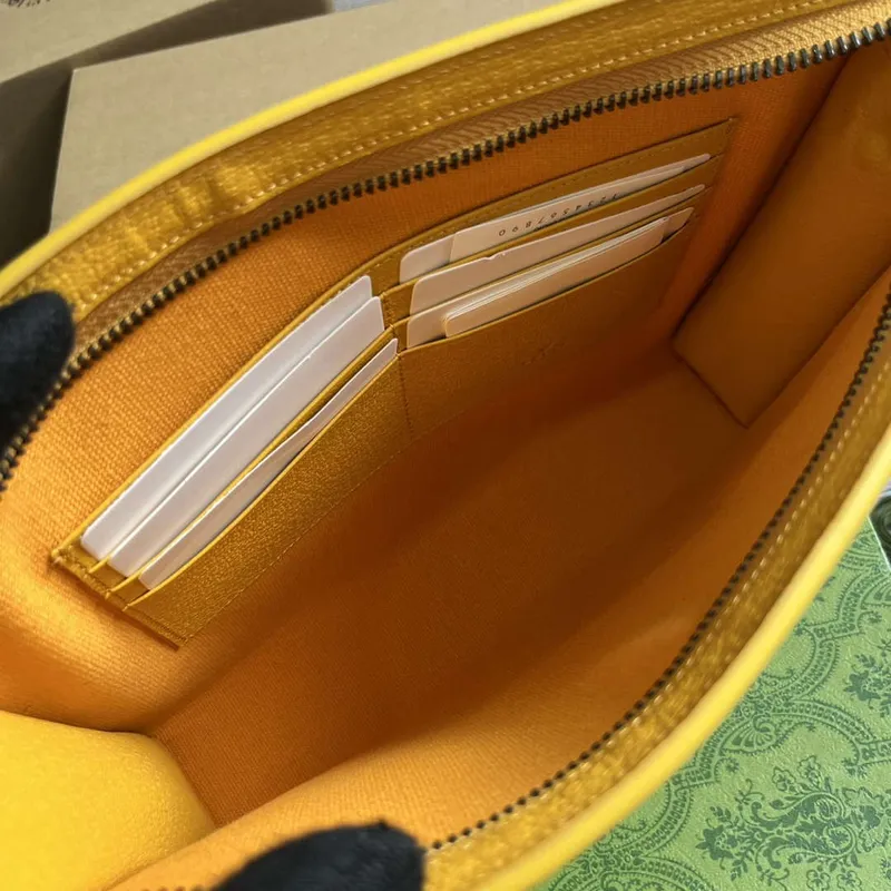 Gucci 768255 GG pouch with GG detail Yellow
