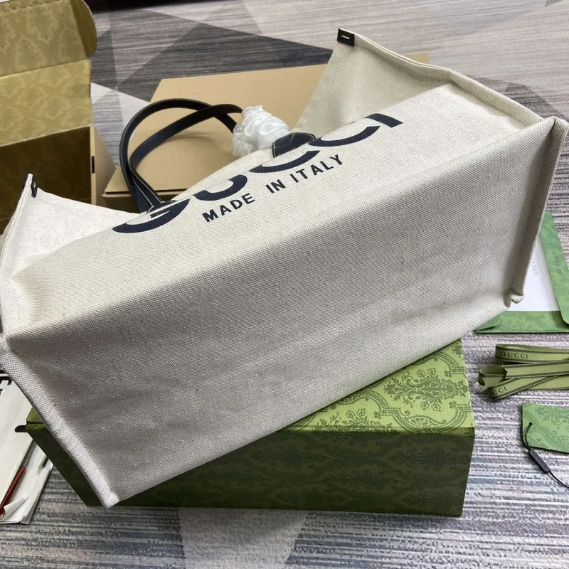 Gucci 772176 Medium Tote Bag With Gucci Print Black leather trim