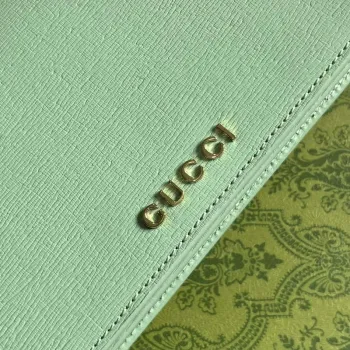 Gucci 772643 Chain Wallet With Gucci Script Pale green
