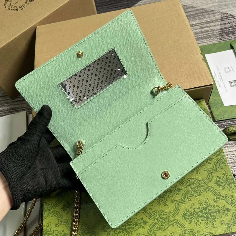 Gucci 772643 Chain Wallet With Gucci Script Pale green