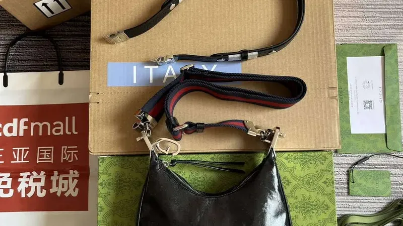 Gucci Attache Small Shoulder Bag 699409 — Black GG Crystal Elegance