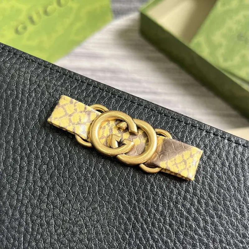 Gucci 750458 Zip wallet with Interlocking G python bow Black