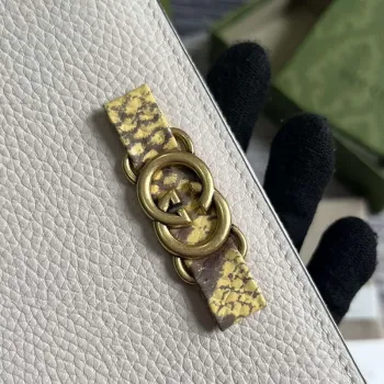 Gucci 750458 Zip wallet with Interlocking G python bow White