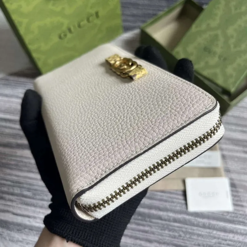 Gucci 750458 Zip wallet with Interlocking G python bow White