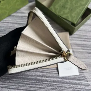 Gucci 750458 Zip wallet with Interlocking G python bow White