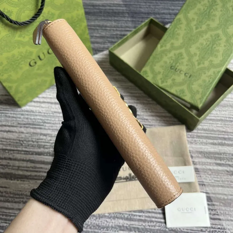 Gucci 750458 Zip wallet with Interlocking G python bow Rose beige