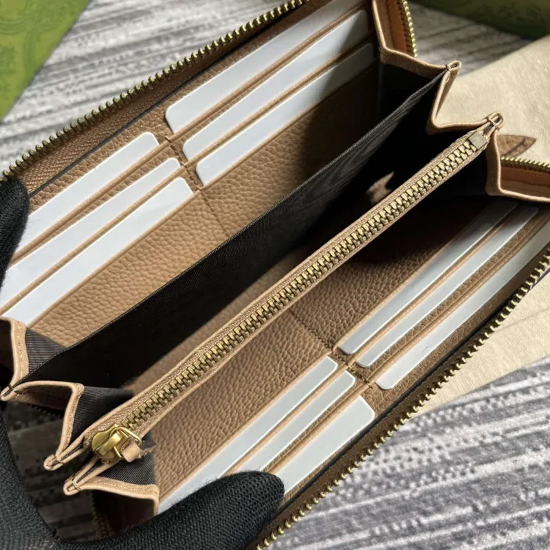 Gucci 750458 Zip wallet with Interlocking G python bow Rose beige