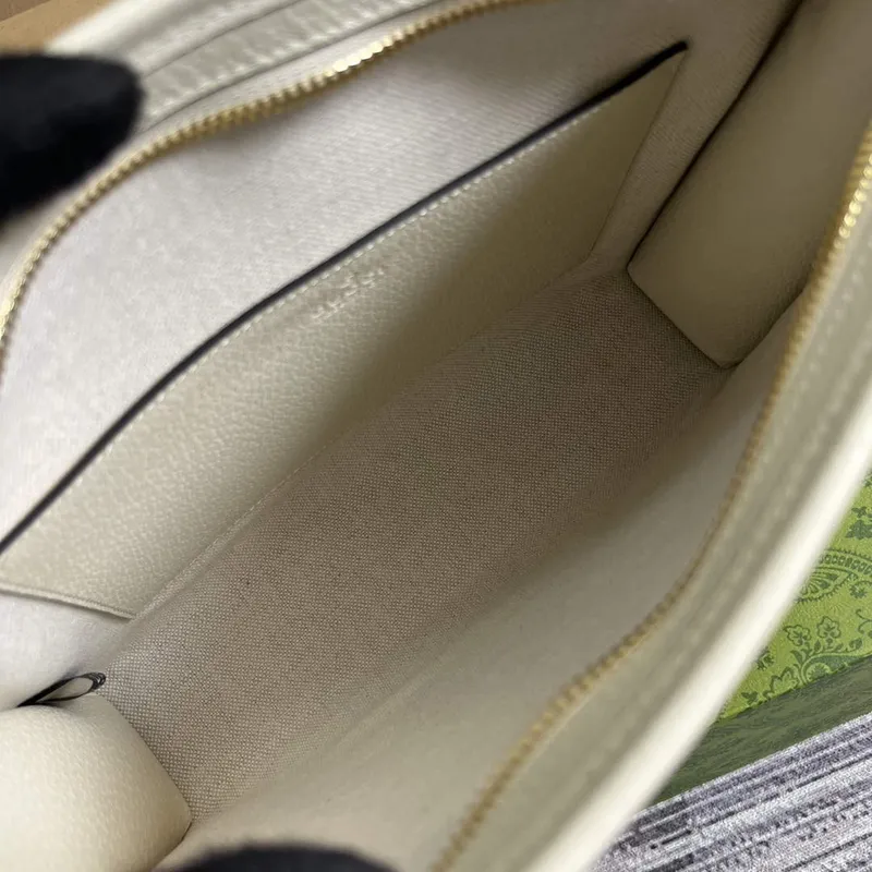 Gucci 736753 Gucci animal print toiletry case