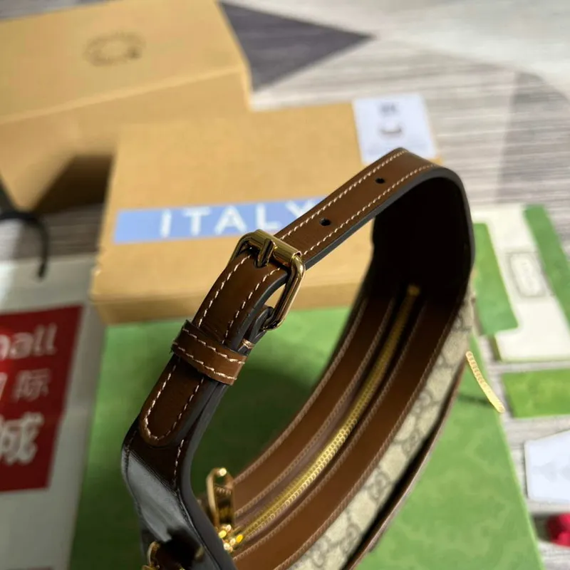 Gucci 726843 Half moon shaped mini bag with Interlocking G Brown