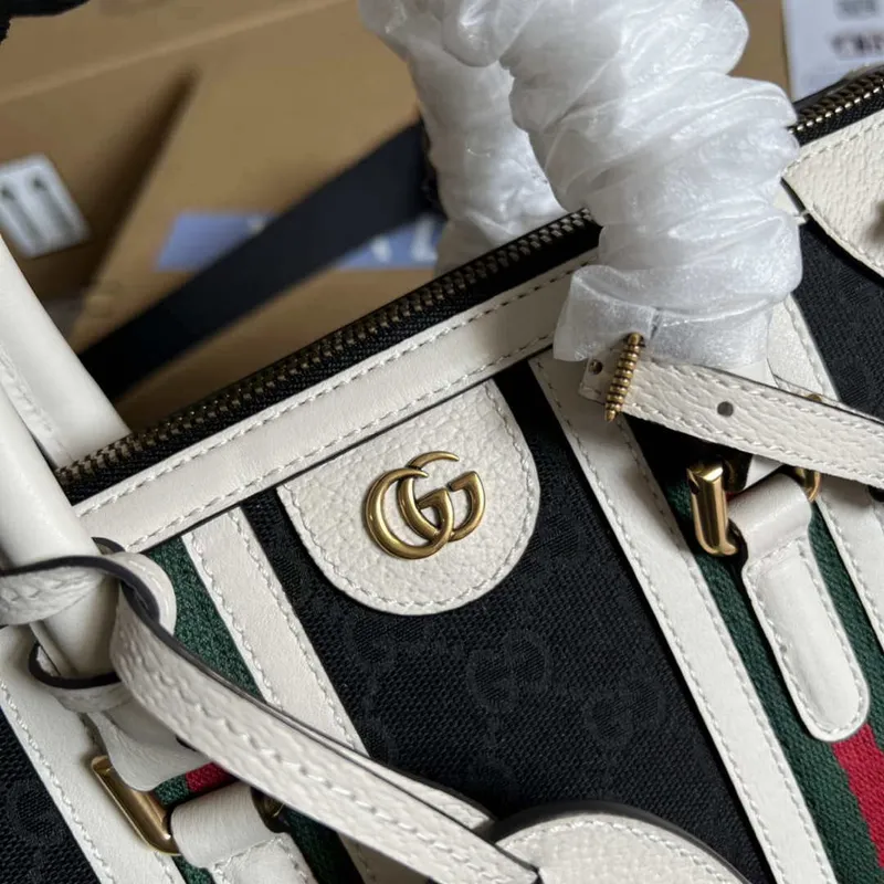 Gucci 715772 Small canvas top handle bag White and Black