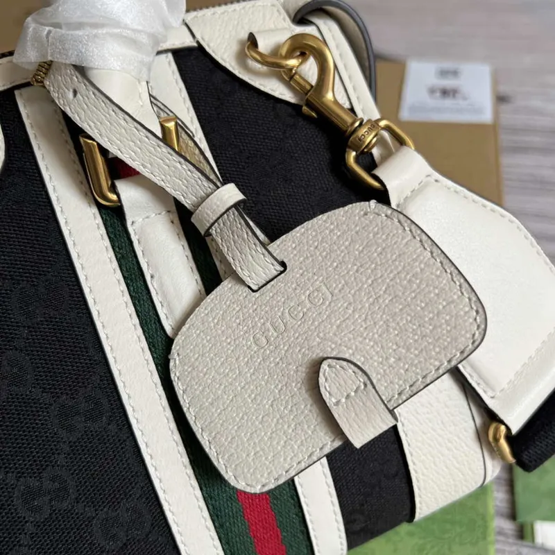 Gucci 715772 Small canvas top handle bag White and Black