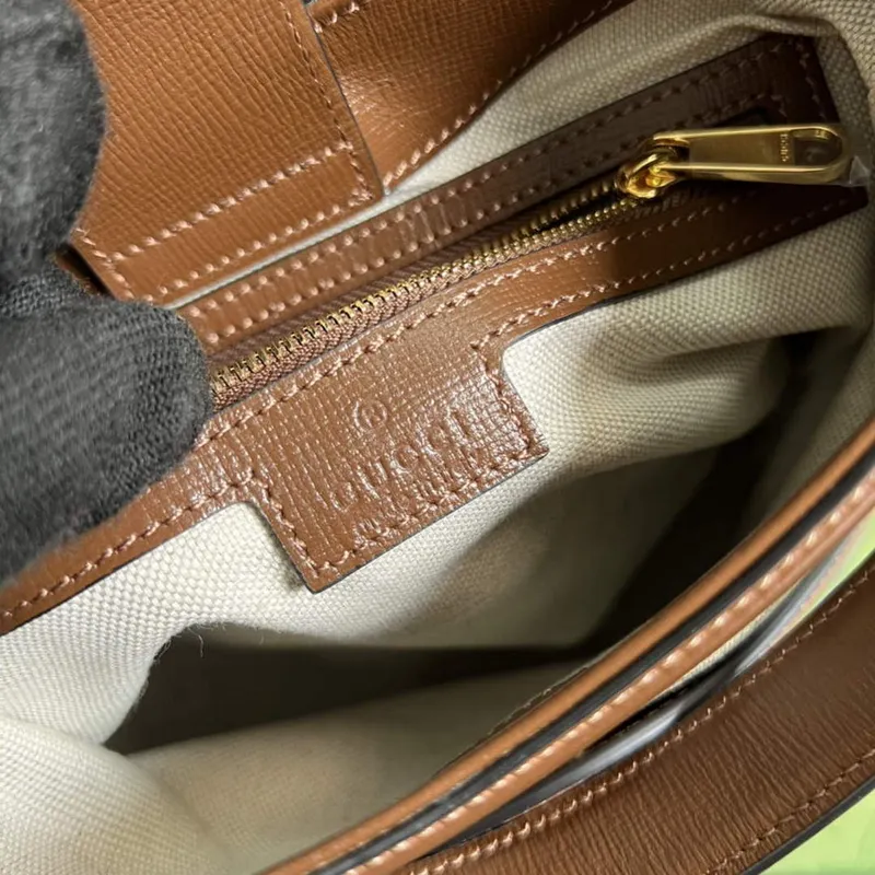 Gucci 696011 Large shoulder bag with Interlocking G Brown