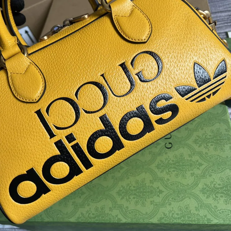 Adidas x Gucci 702397 mini duffle bag yellow