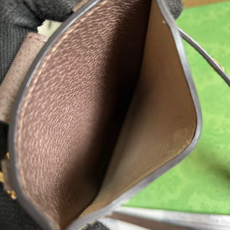 Gucci 700732 Gucci cat print phone case Brown