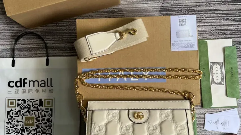 Gucci 702200 GG Matelassé Leather Shoulder Bag in White — Slimline Luxury