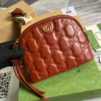 Gucci 702229 GG matelassé leather shoulder bag Light brown