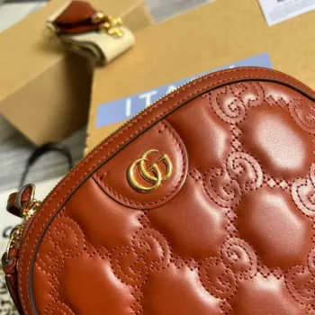 Gucci 702229 GG matelassé leather shoulder bag Light brown