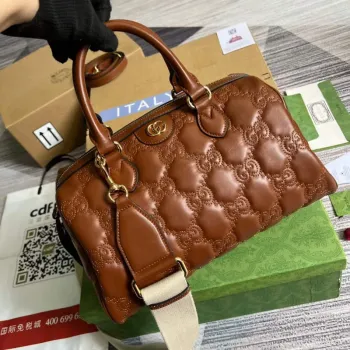 Gucci 702242 GG matelassé leather shoulder bag Brown