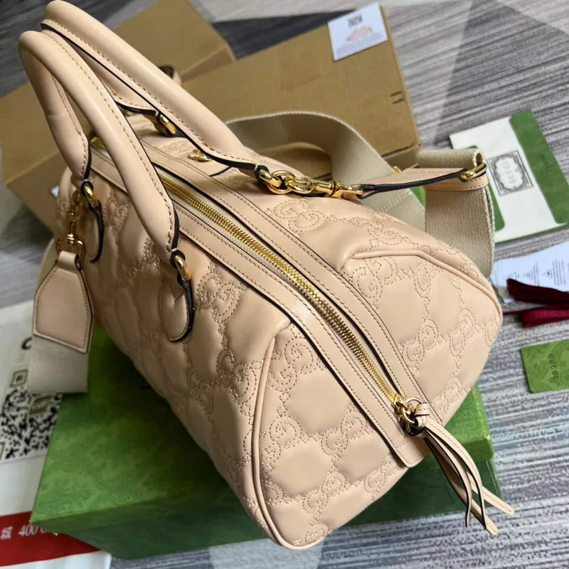Gucci 702242 GG matelassé leather shoulder bag Beige