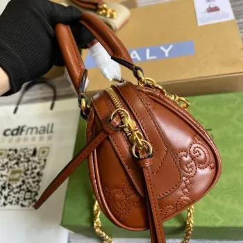 Gucci 702251 GG matelassé leather top handle bag Brown