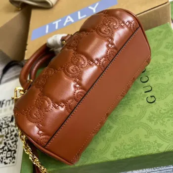 Gucci 702251 GG matelassé leather top handle bag Brown