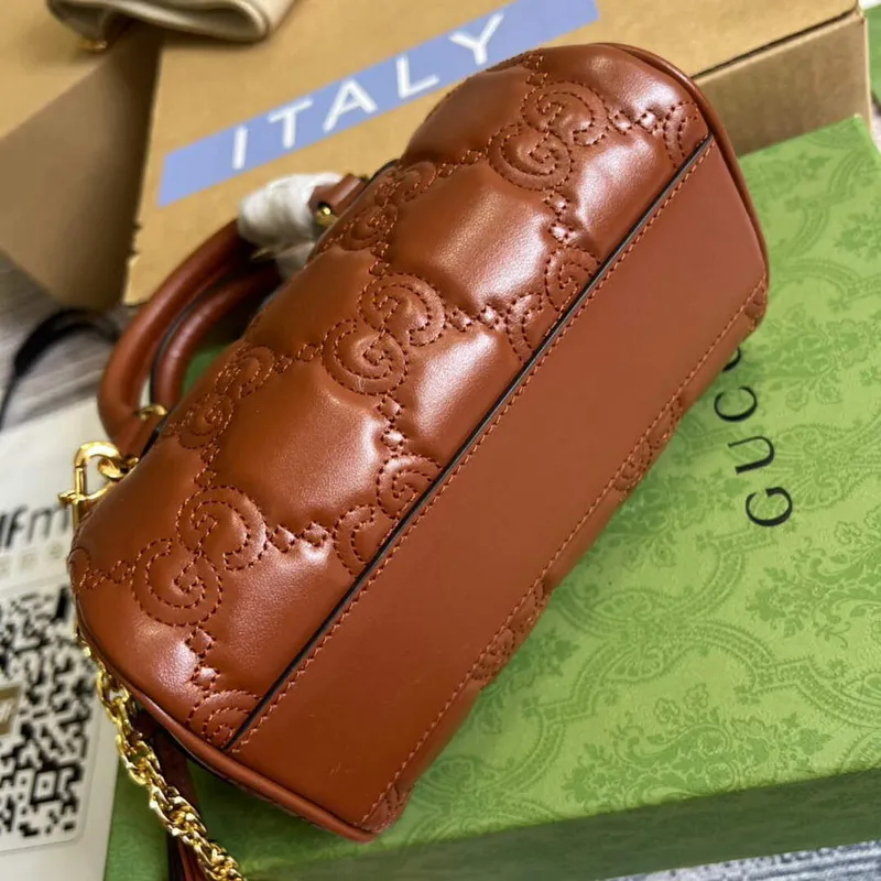 Gucci 702251 GG matelassé leather top handle bag Brown