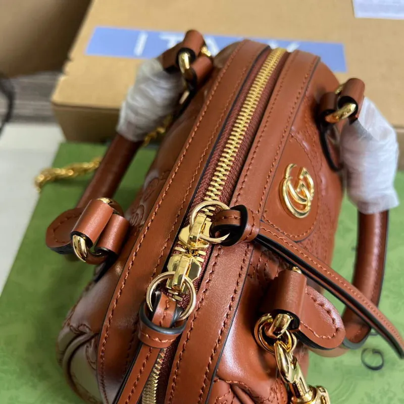 Gucci 702251 GG matelassé leather top handle bag Brown