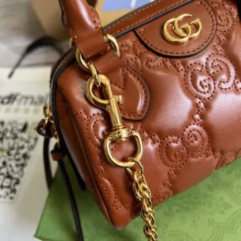 Gucci 702251 GG matelassé leather top handle bag Brown