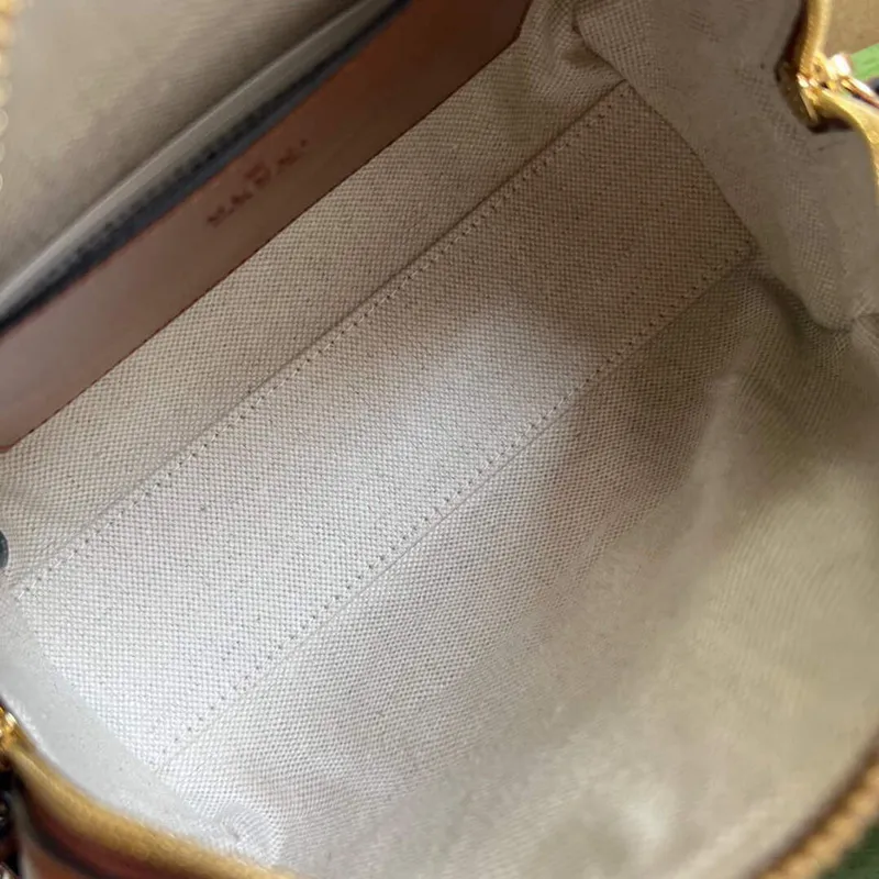 Gucci 702251 GG matelassé leather top handle bag Brown