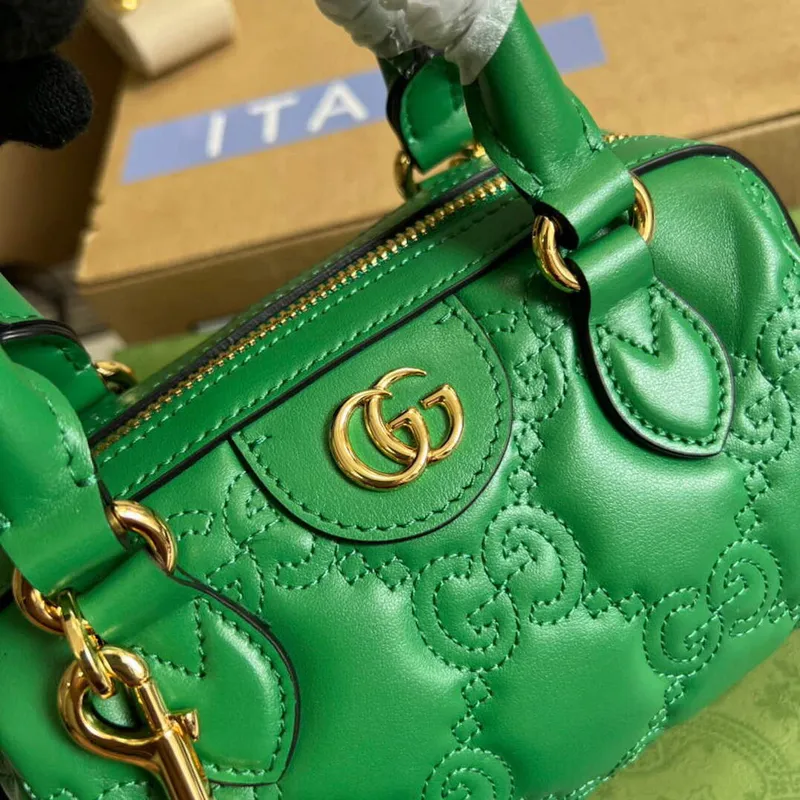 Gucci 702251 GG matelassé leather top handle bag Bright green
