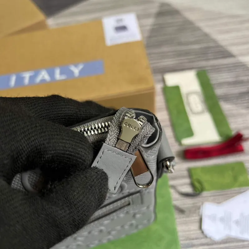 Gucci 406410 GG embossed small messenger bag Grey