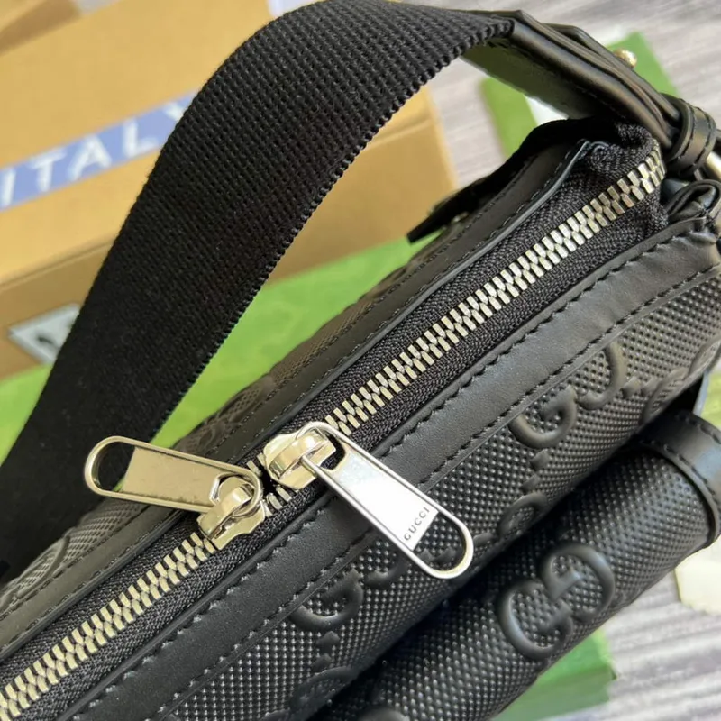 Gucci 674058 GG embossed messenger bag Black