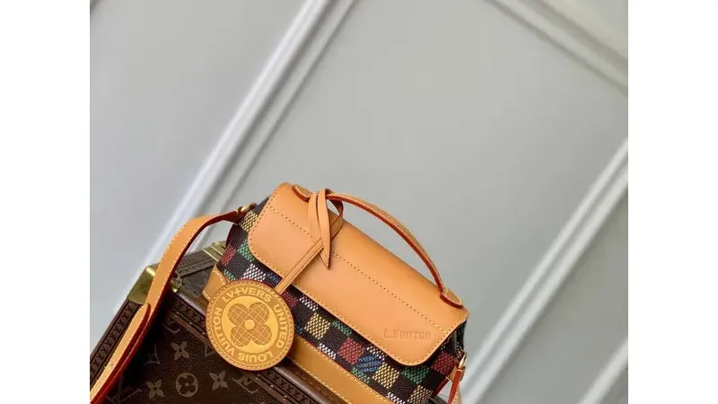 LV N00187 Louis Vuitton Steamer East West Wearable Wallet Multicolor: Pharrell Reimagines a Classic