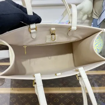 LV M21575 Louis Vuitton OnTheGo MM Bicolor Monogram Empreinte Leather Latte Pink