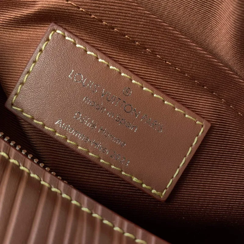 LV M23092 Louis Vuitton Soft Polochon Cross body Bag Cognac