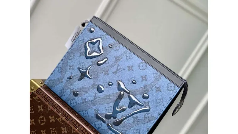 Holiday Spotlight: Louis Vuitton Pochette Voyage MM in Abyss Blue — A Festive Gift of Oceanic Elegance