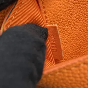 LV M57081 Louis Vuitton Takeoff Slingbag Orange