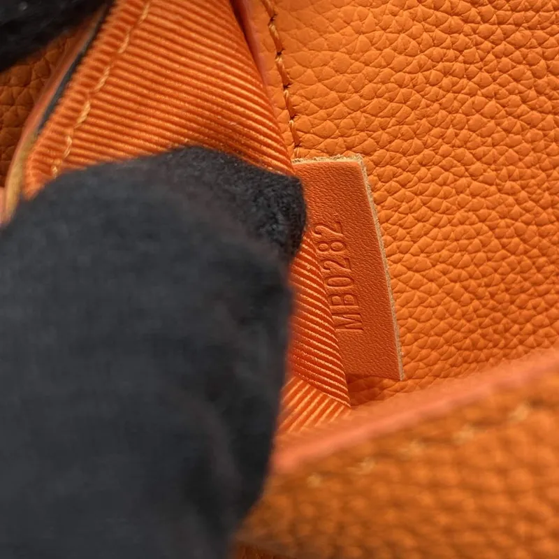 LV M57081 Louis Vuitton Takeoff Slingbag Orange