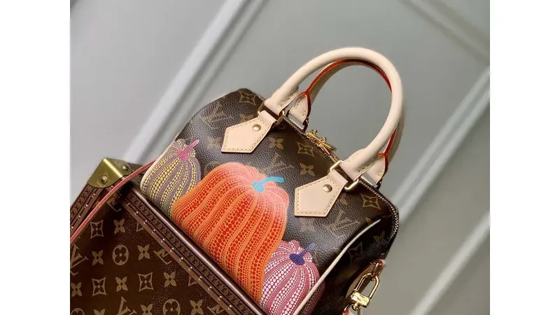 Louis Vuitton M46469 LV x YK Speedy Bandoulière 20 Monogram Pumpkins: Compact Artistry for Collector Style