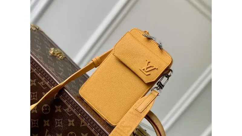 Wrap Up Joy: LV M57089 Louis Vuitton Phone Pouch in Festive Yellow
