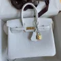 Hermes Birkin 25 Retourne Handmade Bag In White Clemence Leather