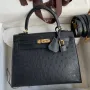 Kelly Sellier 25 Handmade Bag In Black Ostrich Leather